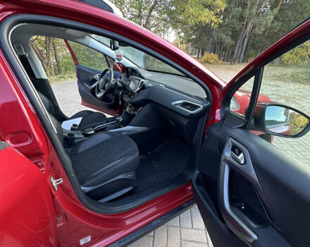 Червоний Пежо 2008, об'ємом двигуна 1.2 л та пробігом 159 тис. км за 10999 $, фото 2 на Automoto.ua