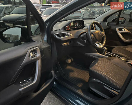 Зелений Пежо 2008, об'ємом двигуна 1.2 л та пробігом 116 тис. км за 11750 $, фото 8 на Automoto.ua