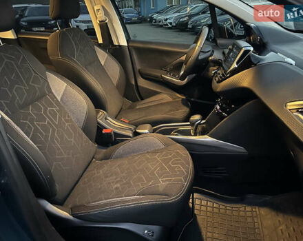 Зелений Пежо 2008, об'ємом двигуна 1.2 л та пробігом 116 тис. км за 11750 $, фото 12 на Automoto.ua