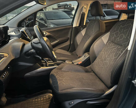 Зелений Пежо 2008, об'ємом двигуна 1.2 л та пробігом 116 тис. км за 11750 $, фото 6 на Automoto.ua