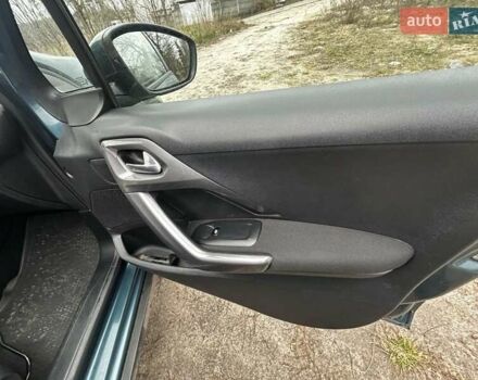 Зеленый Пежо 2008, объемом двигателя 1.2 л и пробегом 85 тыс. км за 9900 $, фото 13 на Automoto.ua