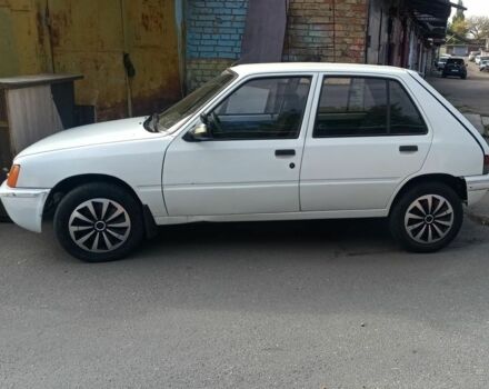 Белый Пежо 205, объемом двигателя 2 л и пробегом 285 тыс. км за 1500 $, фото 1 на Automoto.ua