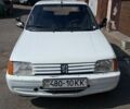 Белый Пежо 205, объемом двигателя 2 л и пробегом 285 тыс. км за 1500 $, фото 6 на Automoto.ua