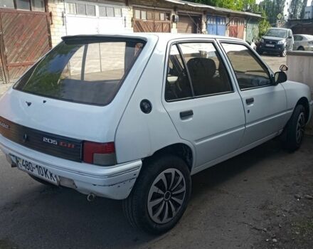 Белый Пежо 205, объемом двигателя 2 л и пробегом 285 тыс. км за 1500 $, фото 5 на Automoto.ua