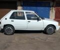 Белый Пежо 205, объемом двигателя 2 л и пробегом 285 тыс. км за 1500 $, фото 1 на Automoto.ua