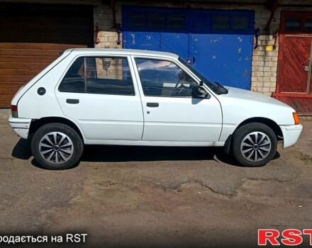 Білий Пежо 205, об'ємом двигуна 1.8 л та пробігом 200 тис. км за 1500 $, фото 3 на Automoto.ua
