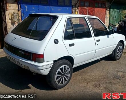 Білий Пежо 205, об'ємом двигуна 1.8 л та пробігом 200 тис. км за 1500 $, фото 2 на Automoto.ua