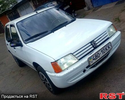 Білий Пежо 205, об'ємом двигуна 1.8 л та пробігом 200 тис. км за 1500 $, фото 1 на Automoto.ua