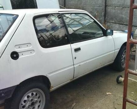 Білий Пежо 205, об'ємом двигуна 0 л та пробігом 100 тис. км за 300 $, фото 1 на Automoto.ua
