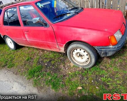 Красный Пежо 205, объемом двигателя 1.9 л и пробегом 585 тыс. км за 500 $, фото 1 на Automoto.ua