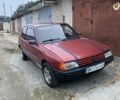 Красный Пежо 205, объемом двигателя 1.8 л и пробегом 200 тыс. км за 700 $, фото 1 на Automoto.ua