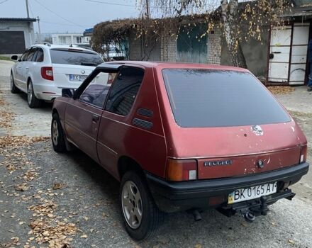 Красный Пежо 205, объемом двигателя 1.8 л и пробегом 200 тыс. км за 700 $, фото 2 на Automoto.ua