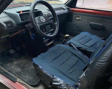 Красный Пежо 205, объемом двигателя 1.8 л и пробегом 200 тыс. км за 700 $, фото 4 на Automoto.ua