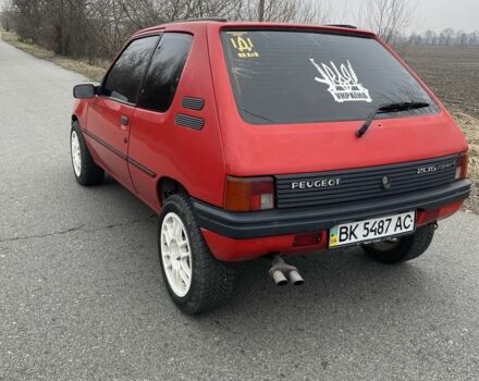 Красный Пежо 205, объемом двигателя 1.6 л и пробегом 450 тыс. км за 1150 $, фото 5 на Automoto.ua