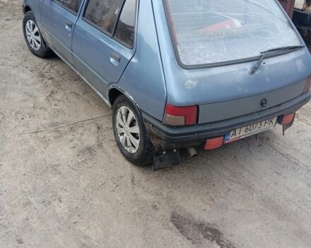 Серый Пежо 205, объемом двигателя 1.8 л и пробегом 250 тыс. км за 650 $, фото 2 на Automoto.ua