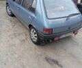 Серый Пежо 205, объемом двигателя 1.8 л и пробегом 250 тыс. км за 650 $, фото 2 на Automoto.ua