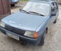 Серый Пежо 205, объемом двигателя 1.8 л и пробегом 250 тыс. км за 650 $, фото 1 на Automoto.ua