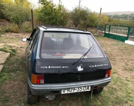 Серый Пежо 205, объемом двигателя 1.7 л и пробегом 200 тыс. км за 800 $, фото 1 на Automoto.ua