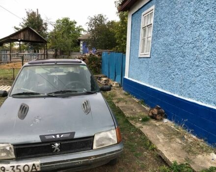 Серый Пежо 205, объемом двигателя 1.7 л и пробегом 200 тыс. км за 800 $, фото 2 на Automoto.ua