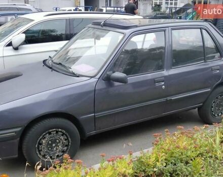 Синий Пежо 205, объемом двигателя 1.6 л и пробегом 320 тыс. км за 1700 $, фото 2 на Automoto.ua