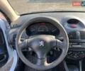 Белый Пежо 206, объемом двигателя 1.87 л и пробегом 89 тыс. км за 1990 $, фото 3 на Automoto.ua