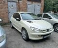 Белый Пежо 206, объемом двигателя 1.4 л и пробегом 220 тыс. км за 3400 $, фото 1 на Automoto.ua