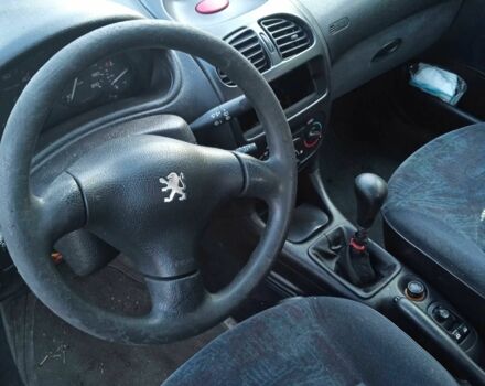 Белый Пежо 206, объемом двигателя 2 л и пробегом 345 тыс. км за 310 $, фото 14 на Automoto.ua