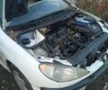 Белый Пежо 206, объемом двигателя 2 л и пробегом 345 тыс. км за 310 $, фото 1 на Automoto.ua