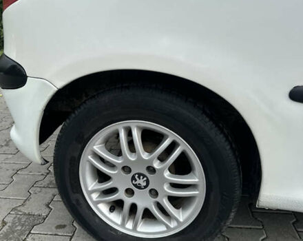 Білий Пежо 206, об'ємом двигуна 1.87 л та пробігом 268 тис. км за 3200 $, фото 5 на Automoto.ua