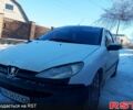 Белый Пежо 206, объемом двигателя 1.1 л и пробегом 265 тыс. км за 1850 $, фото 1 на Automoto.ua