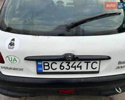 Белый Пежо 206, объемом двигателя 1.1 л и пробегом 265 тыс. км за 1699 $, фото 6 на Automoto.ua