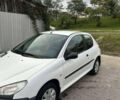 Белый Пежо 206, объемом двигателя 1.1 л и пробегом 265 тыс. км за 1699 $, фото 2 на Automoto.ua