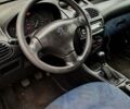 Білий Пежо 206, об'ємом двигуна 1.1 л та пробігом 214 тис. км за 2000 $, фото 5 на Automoto.ua