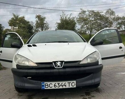 Белый Пежо 206, объемом двигателя 1.1 л и пробегом 265 тыс. км за 1699 $, фото 9 на Automoto.ua