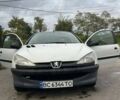 Белый Пежо 206, объемом двигателя 1.1 л и пробегом 265 тыс. км за 1699 $, фото 9 на Automoto.ua