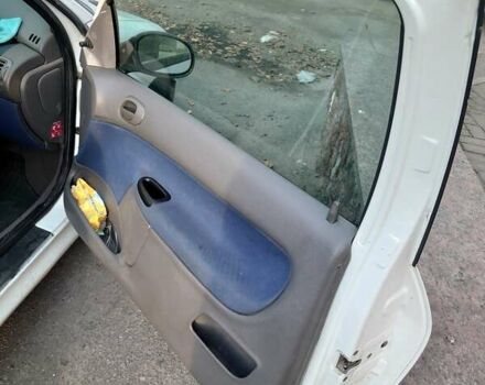 Білий Пежо 206, об'ємом двигуна 1.36 л та пробігом 253 тис. км за 1900 $, фото 7 на Automoto.ua