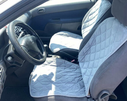 Белый Пежо 206, объемом двигателя 1.36 л и пробегом 293 тыс. км за 2500 $, фото 9 на Automoto.ua