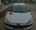 Білий Пежо 206, об'ємом двигуна 1.36 л та пробігом 253 тис. км за 1900 $, фото 1 на Automoto.ua