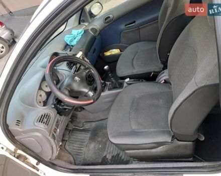 Білий Пежо 206, об'ємом двигуна 1.36 л та пробігом 253 тис. км за 1900 $, фото 9 на Automoto.ua