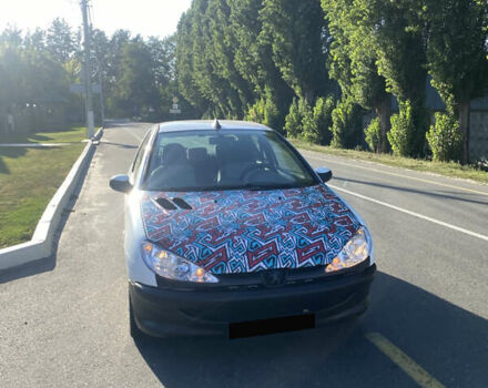 Белый Пежо 206, объемом двигателя 1.36 л и пробегом 293 тыс. км за 2500 $, фото 3 на Automoto.ua