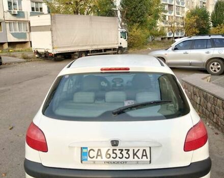 Білий Пежо 206, об'ємом двигуна 1.36 л та пробігом 253 тис. км за 1900 $, фото 3 на Automoto.ua