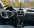 Білий Пежо 206, об'ємом двигуна 2 л та пробігом 300 тис. км за 1000 $, фото 7 на Automoto.ua