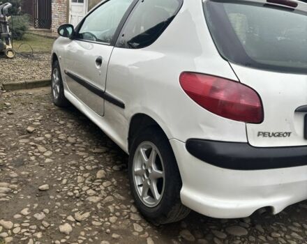 Белый Пежо 206, объемом двигателя 1.1 л и пробегом 387 тыс. км за 1600 $, фото 5 на Automoto.ua