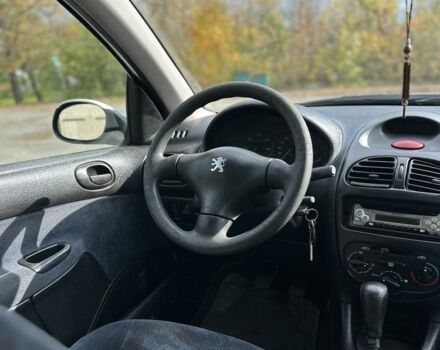 Білий Пежо 206, об'ємом двигуна 2 л та пробігом 300 тис. км за 1000 $, фото 8 на Automoto.ua