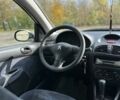 Білий Пежо 206, об'ємом двигуна 2 л та пробігом 300 тис. км за 1000 $, фото 8 на Automoto.ua