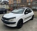 Белый Пежо 206, объемом двигателя 1.4 л и пробегом 317 тыс. км за 2000 $, фото 1 на Automoto.ua