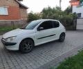 Белый Пежо 206, объемом двигателя 1.36 л и пробегом 293 тыс. км за 2200 $, фото 1 на Automoto.ua