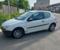 Белый Пежо 206, объемом двигателя 1.4 л и пробегом 359 тыс. км за 2800 $, фото 1 на Automoto.ua