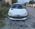 Білий Пежо 206, об'ємом двигуна 0 л та пробігом 266 тис. км за 1558 $, фото 1 на Automoto.ua