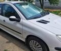 Белый Пежо 206, объемом двигателя 1.4 л и пробегом 100 тыс. км за 2500 $, фото 1 на Automoto.ua